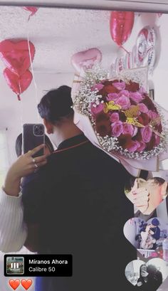 a man holding a bouquet of roses in front of his face and taking a selfie