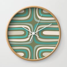 a clock with an abstract design on the face