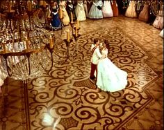 a bride and groom are dancing on the dance floor