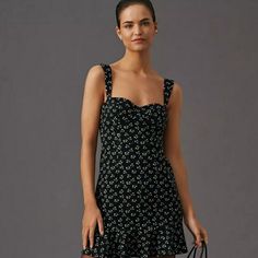 Anthropologie Hutch Ditsy Floral Corset Mini Dress In Black Motif. Size Xl (16) Falls 34.5" From Shoulder Bust 42.5" Natural Waist 34.5" Hips 44.5" Flirty Floral Back Zip Polyester, Spandex Stretchy Fully Lined Corset Style Bodice Nwt Chic Fitted Dresses With Ditsy Floral Print, Black Sundress With Ruffle Hem, Black Ruffle Hem Sundress, Black Sleeveless Dress With Ditsy Floral Print, Black Square Neck Mini Dress With Floral Print, Chic Black Dresses With Ditsy Floral Print, Black Mini Dress With Ditsy Floral Print, Printed Black Mini Dress For Night Out, Black Printed Dress For Date Night