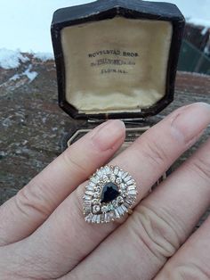 Beautiful 14k Gold Baguette Round Diamond, Pear Shaped Natural Blue Sapphire Wedding Engagement Ballerina ring.Diamonds are SI- I, GJ range. Size is 8 1/4, sizable..Weight is 6.6 Grams..Perfect Pre Owned Condition.Measurements are Approximately  20.5mm x 16.5mm ..Pear Shaped Sapphire Approximately 0.50ct. Ballerina Ring, Gold Diamond Earrings Studs, Gold Diamond Studs, Sapphire Wedding, Natural Blue Sapphire, Diamond Earrings Studs, Diamond Studs, Cocktail Rings, Diamond Wedding