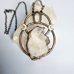 This is a clear quartz cluster necklace with a grey moonstone and crescent moon accent. The pendant was plated in a thick layer of copper then given an antique finish. The pendant height is approximately 2.5 inches with a 1.5 inch width. It hangs from a gunmetal chain in your choice on length. The pendant was hand shaped, polished, and sealed to prevent tarnishing. You will receiving the exact necklace pictured, it's ready to ship! Message me if you have any questions or if your interested in a Grey Moonstone, Boho Statement Necklace, Crescent Moon Necklace, Cluster Necklace, Hand Shapes, Quartz Cluster, Clear Quartz Crystal, Moon Necklace, Crystal Cluster