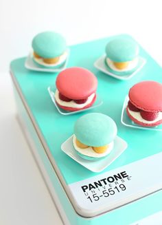 there are four macaroons on the tray