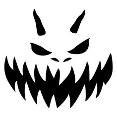 an evil face with sharp teeth and fangs on it's head is shown in black