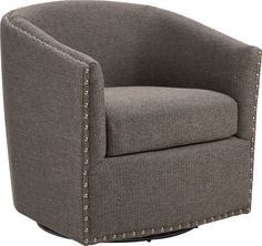 a gray chair with studded trim around it