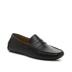 Vince Camuto-Esmail Penny Loafer Enhance your handsome ensemble with the Esmail penny loafers from Vince Camuto. These leather slip-ons feature a classic driver sole that stands out when worn with slacks or dark wash jeans.