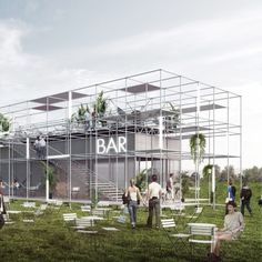 people standing and sitting in the grass near a building with plants growing on it's roof