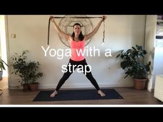 a woman in a yoga pose with the words yoga with a strap above her head