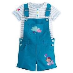 Caring cutie Doc McStuffins and Professor Hootsburgh star on this colorful overall set adorned with embroidered hearts and clouds. Featuring an adorable striped shirt, this sweet set will let your little doctor treat patients in style and comfort. Magic in the details... Set includes overall shorts and short sleeve tee Overalls with open pocket featuring embroidered clouds and hearts Doc McStuffins and Professor Hootsburgh appliqué with embroidered trim Two side pockets and two back pockets Two Cute Cotton Sets With Pockets, Cartoon Print Cotton Short Sets, Cotton Cartoon Print Short Sets, Cute Summer Sets With Pockets, Fitted Cotton Cartoon Print Sets, Cute Cotton Sets With Character Print, Cotton Cartoon Print Jumpsuits And Rompers For Playwear, Cute Jumpsuits And Rompers With Pockets For Playtime, Cotton Jumpsuits And Rompers With Cartoon Print For Playwear