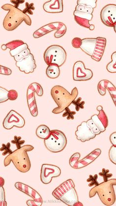 watercolor christmas cookies and candy canes on a pink background with snowman, reindeer, santa hat, heart shaped candies