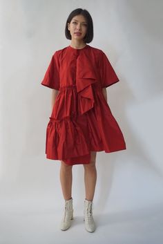 The Farfalle Babydoll Dress is a bold trapeze-cut dress in rich silk taffeta. A gathered silk panel on the bodice can be worn as a sculptural detail or a romantic cascading neckline. Raw edge ruffled seams, a dance-everywhere dressed up/down silhouette, finished with a delicate front pocket for stashing after-dinner mints. Loose billowing fit. Keyhole back closure. Pre-order only, ships late Summer 2022. Voluminous A-line Dress With Ruffles, Taffeta Mini Dress With Ruffles, Chic Taffeta Dress With Voluminous Skirt, Chic Voluminous Taffeta Dress, Daywear Dresses With Ruffles And Voluminous Skirt, Billowy Dresses For Gatherings, Summer Taffeta Dress With Ruffles, A-line Taffeta Dress With Ruffles, Silk Dress With Voluminous Gathered Skirt