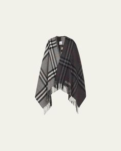 Burberry giant check center split cape made of wool and cashmere     Features logo     Approx. 55"L    Cape sleeves     Fringe trim     Dry clean    Made in United Kingdom Luxury Oversized Cozy Cape, Luxury Oversized Winter Cape, Luxury Wool Long Sleeve Cape, Burberry Poncho, Burberry Plaid Poncho, Check Logo, Giant Check, Hooded Cape, Evening Flats