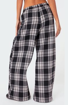 Lounging at home has never looked as good as it does in classic plaid pants cut in a breezy wide-leg silhouette with a comfortable drawstring waistband. Elastic/drawstring waist Front slant pockets 50% cotton, 50% polyester Machine wash, line dry Imported Plaid Wide Leg Pants, Visionary Fashion, Wide Leg Sweatpants, Pants Wide Leg, Plaid Pants, Cute Tshirts, Patterned Fabric, S Models, Plaid Pattern