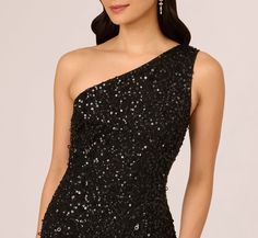 Go for glamor on your next evening under the stars in this beaded one shoulder dress. This formal dress features a one shoulder neckline, fitted bodice, and an ankle-length column skirt. Featuring our beloved allover sequin beading, this one shoulder gown is crafted from knit meshand fully lined. A zipper closure at the side of the dress completes the look. Trend-forward yet timeless, this ankle-length dress will shine for a formal night out with nude heels and a simple clutch. Style Number: AP1 One Shoulder Black Dress Formal, Embellished One Shoulder Gala Dress, Black Embellished One Shoulder Dress, Embellished Sleeveless One Shoulder Evening Dress, Embellished Black One Shoulder Dress, Embellished One Shoulder Dress With Asymmetrical Neckline For Prom, Embellished Sleeveless One Shoulder Formal Dress, Formal Embellished One Shoulder Sleeveless Dress, Embellished One Shoulder Dress For Prom