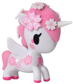 a little pony toy with pink hair and flowers on it's head, standing in front of a white background