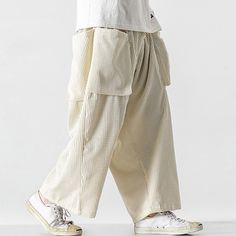 Season:Spring   Fall,Winter; Fabric:Polyester; Gender:Men's; Style:Casual,Fashion; Occasion:Daily,Going out,Outdoor; Fit Type:Regular Fit; Function:Breathable,Soft,Comfort; Waistline:Mid Waist; Pattern:Plain; Design:Pocket,Drawstring,Elastic Waist; Pants Type:Sweatpants,Corduroy Pants,Wide Leg Sweatpants; Front page:FF; Listing Date:11/24/2023; Hips:; Length:; Waist: Casual Beige Winter Bottoms, Casual Beige Pants For Winter, Beige Bottoms With Pockets For Winter, Winter Beige Bottoms With Pockets, Casual Corduroy Bottoms With Cargo Pockets, Casual Parachute Pants With Pockets For Winter, Baggy Corduroy Pants For Winter, Casual Winter Parachute Pants With Pockets, Cotton Wide-leg Cargo Pants For Winter