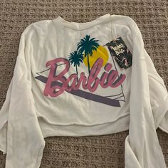 Show Me Your Mumu Barbie Sweatshirt New With Tags- Great Condition!! White Slogan Crew Neck Top, Sporty White Slogan Top, Sporty White Top With Slogan, White Cotton Graphic Tee Sweatshirt, White Slogan Crew Neck Sweatshirt, White Long Sleeve Top With Slogan, White Long Sleeve Slogan T-shirt, Trendy White Sweatshirt With Slogan, White Long Sleeve T-shirt With Slogan