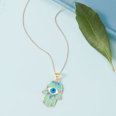 Ross-Simons - Blue Enamel Hamsa Pendant Necklace in 14kt Yellow Gold. 18". Offering happiness, good fortune, peace and protection, this stylish Hamsa is detailed in double-sided blue enamel with scrolls of polished 14kt yellow gold. Suspends from a cable chain. Wear this beauty whenever your mood needs a boost! Springring clasp, Hamsa pendant necklace. Blue Hallmarked Amulet Necklaces, Blue Spiritual Gold-plated Necklaces, Blue Round Pendant Necklace For Good Luck, Symbolic Blue Necklace With Round Pendant, Symbolic Blue Round Pendant Necklace, Symbolic Blue 14k Gold Jewelry, Spiritual Blue Tarnish Resistant Jewelry, Spiritual Blue Tarnish-resistant Jewelry, Spiritual Blue Gold-plated Jewelry