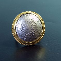 ARTSMYRNA METAL: 925k Silver GEM: Bronze Replica Coin COATING: 24k gold over (We can made a special type of coating for your personal preference ) MATERIEL : 925K Sterling Silver ( Some of my items vermeil gold over silver for looks rich . But i can finish in silver too ) RING SIZE: 6 (your desired size is made) SPECIAL ORDER IS MADE. If you send us a photo of your desired model (you can send your gem.) We can do it for you. We can make any design you want with natural gem. YOU JUST WANT IT ,WE Vintage Intaglio Coin Jewelry, Antique Coin Shaped Engraved Signet Ring, Ancient Bronze Coin Jewelry, Antique Coin-shaped Metal Jewelry, Vintage Bronze Coin-shaped Jewelry, How To Look Rich, Signet Rings, Roman Art, Coin Ring