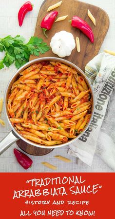 a pan filled with pasta and sauce on top of a wooden cutting board next to garlic