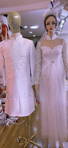 Beautiful traditional Vietnamese Ao Dai made to fit your measurements! Choose between 3 styles Style 1: Beaded lace patterns with ruched front - can be ordered as single or couple Style 2: Beaded lace patterns Style 3: Hand drawn patterns - can be ordered as single or couple Optional head piece at extra cost: please message us with a style you want - Price include pants for the lady's Ao dai The dress will need 2-3 weeks to be made. Please send us your body measurements (see last image) after pa Traditional Fitted White Wedding Dress, Traditional White Wedding Dress For Ceremonies, Traditional White Embroidered Wedding Dress, Festive White Wedding Dress With Intricate Embroidery, Traditional White Lace For Wedding, White Wedding Lace For Festive Occasions, White Wedding Lace For Festive, Traditional White Bridal Accessories For Marriage, White Wedding Dress With Lace Sleeves