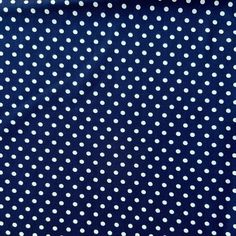 a blue and white polka dot print fabric