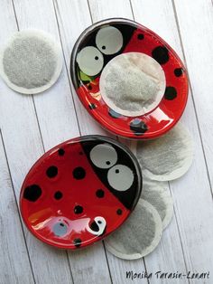 three plates with ladybug designs on them