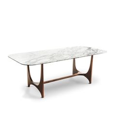 a white marble table with wooden legs