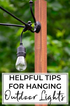 an outdoor light with the words helpful tips for hanging outdoor lights