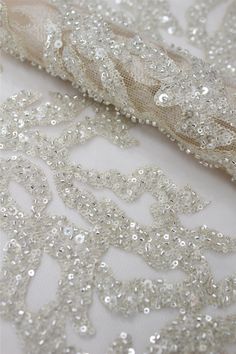 Welcome to Sunny shop. Silver Beaded Bridal Lace Fabric, Embroidery Lace With Sequins for Wedding Gown, Bridal Vail Fabric by Yard, Haute Couture Lace Fabric This lace has an amazing look and is really very heavy. It is perfect the the most unique bridal dresses. Width about: 51inch (130Centimeters) Length : 91.44 Centimeters/ 1Yard Yarn: Metal Yarn Mesh: Nylon （Off-white, Skin color） Sequins: YES - Crystal Beads: YES - Silver Color: off-white+silver, Skin color+ silver 30219 Price is set for on Wedding Embroidered Lace Fabric With Rhinestones, Wedding Lace Fabric With Rhinestones, Wedding Lace Embroidered Fabric With Rhinestones, Beaded Sequin Fabric For Wedding, Beaded Lace Sequin Fabric For Wedding, Embellished Silver Sequin Fabric For Wedding, Silver Embellished Sequin Fabric For Wedding, Fitted Embellished Sequin Fabric For Wedding, Silver Beaded Embroidered Fabric For Wedding