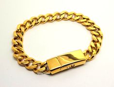 This stylish keepsake bracelet is made from highly polished premium-grade 316L non-tarnish stainless steel, generously plated with real 24k gold. It's a chunky, and relatively heavyweight piece which includes a discreet chamber in which to hold a small, token amount of ashes, fur, sacred earth or whatever you wish to hold close. All orders come complete with a presentation/gift box and a filling kit. The bracelet comes in 4 lengths:  Extra Small - 18cm/7.25inch long, to fit wrists up to 16cm (6 Adjustable Gold Cuban Link Bracelet As Gift, Gold Rectangular Cuban Link Bracelet As Gift, Gold Rectangular Cuban Link Bracelet Gift, Rectangular Gold Cuban Link Bracelet As A Gift, Gold Rectangular Bracelet With Polished Finish, Rectangular Gold Bracelet With Polished Finish, Gold Rectangular Polished Bracelet, Sacred Earth, Urn Bracelet