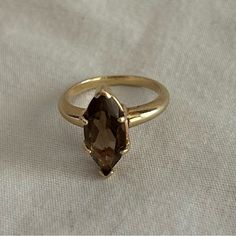 Classic (Maybe Vintage) Smoky Topaz Or Quartz Ring. Not 100% Sure If It's Topaz Or Quartz. Gold Band, Nice Weight. There Are No Markings That Read 10-14-18 Karat So I'm Not Certain Which It Is.Looks Like Some Of My 14 K Pieces If I Had To Guess. Size 6.5 See Pics On The Ring Sizer For Exact Size See Pics For Color. It's A Beautiful, Brownish/Amber Stone. Smoke Free Home. Small Dog Friendly Home. No Return. Sale Is Final On This Piece. Smoky Topaz Ring, Smokey Quartz Ring Engagement, Brown Engagement Ring, Colored Wedding Rings, Mellow Autumn, Smoky Quartz Engagement Ring, Brown Engagement Rings, Moms 60th, Smoky Quartz Ring