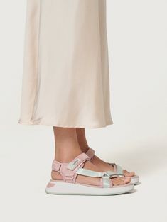 Inspired by the sunsets of MARTINIQUE island. These sandals are designed to be the must-have for sunny days, thanks to the blend of pastel tones in pink and green. Their details and materials in suede, synthetic, and textile not only make them a unique piece but are also synonymous with comfort due to the memory foam insole and padded lining. Perfect for walking and pairing with your favorite jeans or dresses. Remember that these sandals are not made to get wet. Sole height: 5 cm. Casual Pink Sport Sandals For Summer, Pink Sport Sandals For Summer Beach, Pink Cushioned Sport Sandals For Spring, Pink Open Toe Sport Sandals For Summer, Pink Cushioned Summer Sandals, Pink Summer Sandals With Cushioned Footbed, Casual Pink Sport Sandals For Spring, Summer Vacation Pink Sport Sandals, Pink Flat Sport Sandals For Vacation