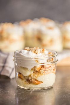 dessert in a jar sitting on top of a table