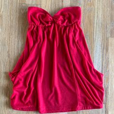 Size S Red, Sweet Heart Strapless Tube Top Nwot Top Has Pockets On Front Side Red Bandeau Tube Top With Built-in Bra, Casual Bandeau Top For Date Night, Flirty Red Tube Top For Spring, Solid Bandeau Tops For Parties, Night Out Tops With Built-in Bra And Sweetheart Neckline, Red Strapless Tube Top With Built-in Bra, Flirty Stretch Strapless Tops, Flirty Strapless Stretch Top, Night Out Tops With Sweetheart Neckline And Built-in Bra