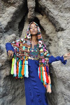 This bedouin vintage shawl is a collectible and literally a one in a million. It is for those who appreciate real vintage pieces. Those that appreciate that this shawl takes months to make by a group of girls in the Siwa Oasis, Egypt. It includes all kinds of beads and sea shells and many other accessories that are difficult to count. This Shawl is inherited from one generation to the next as a wedding gift for the newlyweds to wear on their wedding night. Every single thread in that shawl is ha Bohemian Scarves For Wedding And Eid, Multicolor Dupatta Scarf For Festival, Bohemian Multicolor Shawl For Festival, Multicolor Bohemian Shawl For Festivals, Shawl For Traditional Ceremonies And Festivals, Bohemian Scarves For Weddings And Festivals, Bohemian Embroidered Dupatta Scarf, Festival Shawl For Traditional Ceremonies, Bohemian Embroidered Multicolor Shawl