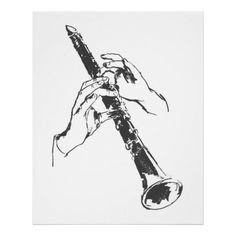 a black and white drawing of a hand holding a flute