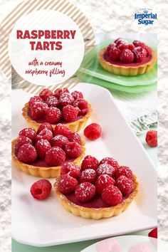 raspberry tarts on a white plate with text overlay reading raspberry tarts with a creamy mystery filling