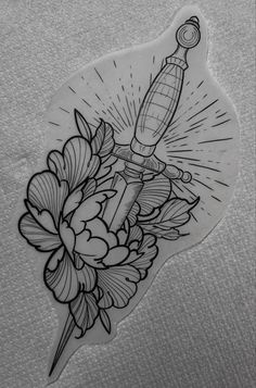 a sticker with an image of a knife and flowers on it's side