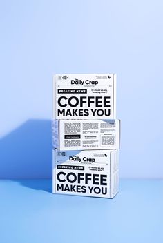 two boxes of coffee are stacked on top of each other with the words coffee makes you