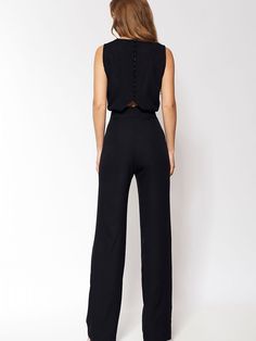 Extremely elegant and feminine jumpsuit is our latest proposition! It emphasizes the waist and lengthens legs thanks to straight legs. The back of the suit is closed with subtle buttons and gently exposes the back - perfect for an evening out paired with stiletto heels. Spandex 5 % Polyester 95 % Size Hips Chest Waist 36 100 cm 96 cm 68.5 cm 38 104 cm 100 cm 72.5 cm 40 108 cm 104 cm 76.5 cm 42 112 cm 108 cm 80.5 cm 44 116 cm 112 cm 84.5 cm Elegant Full-length Strapless Jumpsuit For Party, Elegant Sleeveless Bottoms For Night Out, Elegant Backless Jumpsuits For Date Night, Chic Backless Jumpsuit With Back Opening, Chic Backless Jumpsuits And Rompers With Back Opening, Formal Strapless Backless Fitted Jumpsuit, Formal Fitted Strapless Backless Jumpsuit, Elegant High-waisted Jumpsuit For Party, Elegant High Waist Jumpsuit For Party