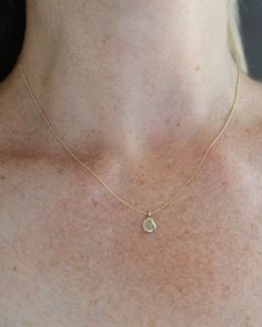 The sweetest, classic silhouette. A little drop of sunlight to wear around your neck. This petite recycled 14k gold droplet measures in at just 1/4" in diameter, and hangs on a delicate cable chain. Available in 16", 18" or 20". Availability: Currently in stock and ready to ship. 14k Gold Charm Necklace With Teardrop Pendant, Dainty 14k Gold Teardrop Pendant Charm Necklace, Delicate Teardrop Charm Necklaces For Everyday, Everyday Delicate Teardrop Charm Necklace, Teardrop 14k Yellow Gold Charm Necklaces, 14k Yellow Gold Teardrop Charm Necklaces, Minimalist Yellow Gold Round Pendant Drop Necklace, Dainty Teardrop 14k Gold Charm Necklaces, Minimalist Teardrop Cable Chain Necklaces