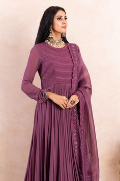 Purple georgette embroidered anarkali with dori and beads work. Comes with organza dupatta and leggings.
Components:3
Pattern:Embroidery
Type of Work:Dori, Beads
Neckline:Round
Sleeve Type:Three quarter
Fabric:Kurta: Georgette; Dupatta: Organza
Color:Purple
Other Details:
Attached lining
Weight approx (in kg) : 500 gms
Note: The neckpiece worn by the model is not for sale
Occasion:Destination Wedding - Aza Fashions Organza Embroidery, Embroidered Anarkali, Georgette Dupatta, Beads Work, Beaded Neckline, Pattern Embroidery, Organza Dupatta, Set For Women, Anarkali