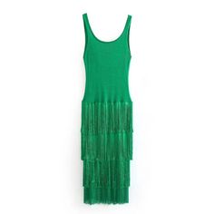 a green dress with fringes on the bottom and side, against a white background