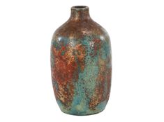 a large vase with rusted paint on it's sides and an orange bottom