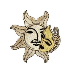 the sun and moon face is embroidered on a white background