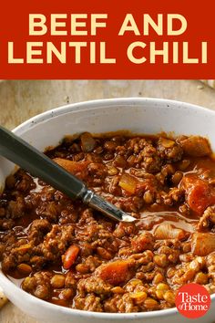 beef and lentil chili in a white bowl with the title overlay above it