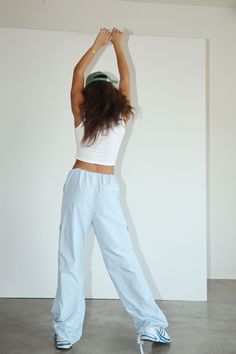 The Lucy Parachute Pant is the perfect pant for when "dressing up" means "dressing down"! Rock these soft-yet-sturdy cargo parachutes for a casual chic look that's as comfy as it is fashion-forward. Easy to pull on, you'll be ready for take-off in no time! Woven with No Stretch Elastic Waist with Drawstring for Easy Pull-On Cargo Pocket Parachute Pant Elastic Cuff at Leg Opening 100% Polyester Model is 5'6 and wearing a size SMALL Wide Leg Cargo Style Parachute Pants For Loungewear, Baggy Cargo Parachute Pants For Loungewear, Baggy Parachute Pants With Cargo Pockets For Loungewear, Spring Parachute Pants With Cargo Pockets For Loungewear, Spring Utility Cargo Pants For Loungewear, Utility Cargo Pants For Spring Loungewear, Summer Cargo Style Parachute Pants With Relaxed Fit, Spring Nylon Cargo Pants With Side Pockets, Cargo Style Pants For Loungewear