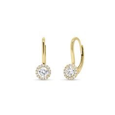 A total classic. Featuring round-brilliant cut diamonds illuminated by sparkling halos, these 18K gold lever back earrings are an essential for every woman’s jewelry box. - 18K gold weighing 2.19 grams - 32 round diamonds totaling 0.11 carats - 2 round diamonds totaling 0.46 carats Available in yellow, white, and rose gold. Please allow 4-6 weeks for delivery if item is not in stock. Item no. E04784 Diamond Evil Eye Bracelet, Diamond Huggie Earrings, Front Back Earrings, Diamond Evil Eye, S Jewelry, Bar Stud Earrings, Diamond Dangle Earrings, Butterfly Earrings Stud, Link Earrings