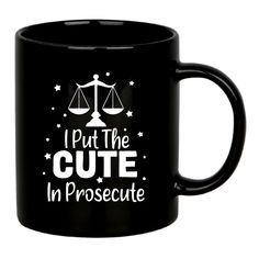 a black coffee mug with the words, i put the cute in procedure on it